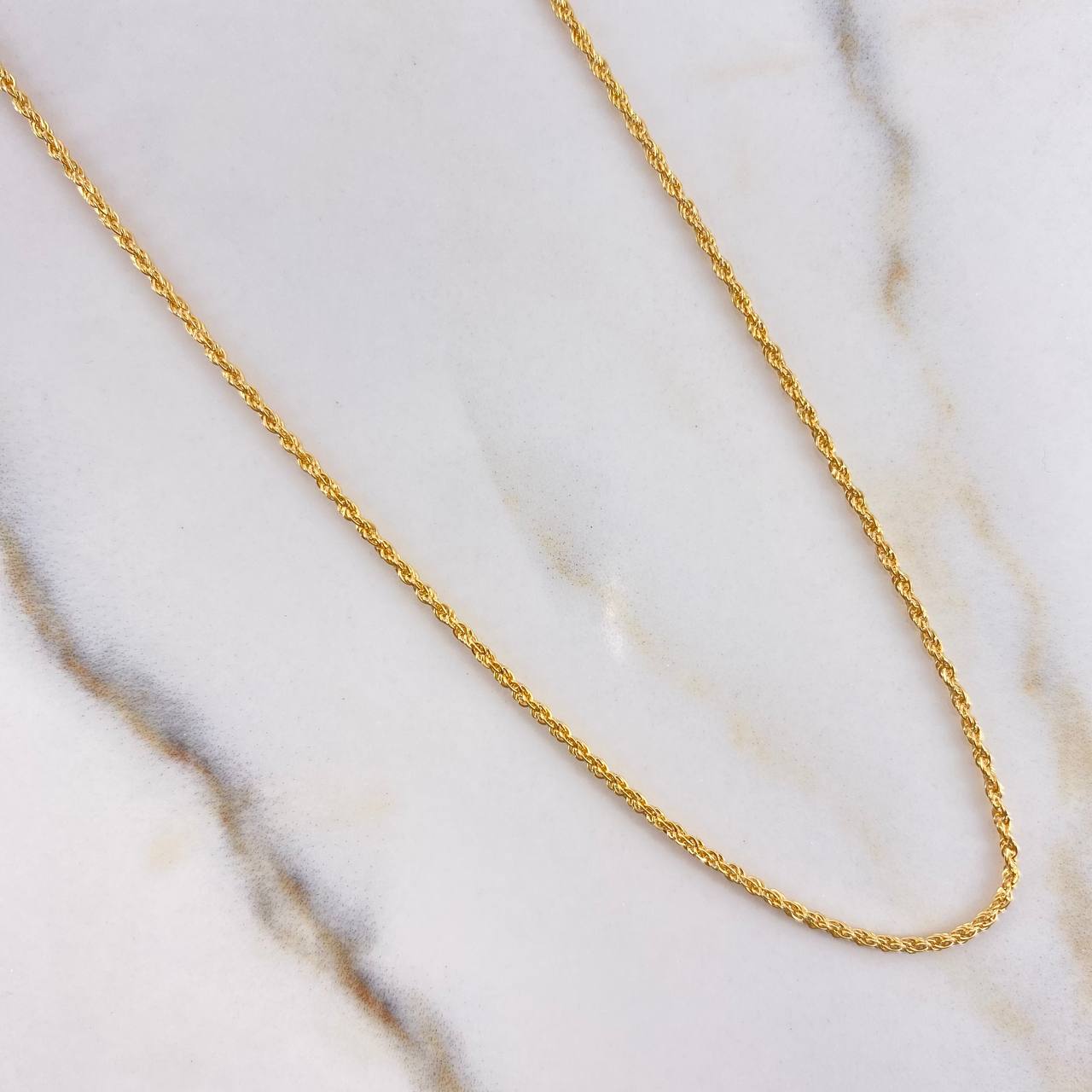 Cadena Lazo 1.10gr / 60cm + Dije Dólar 0.55gr / 2cm Oro Amarillo (Oferta) $