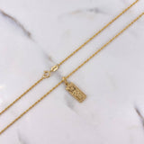 Cadena Lazo 1.10gr / 60cm + Dije Dólar 0.55gr / 2cm Oro Amarillo (Oferta) $