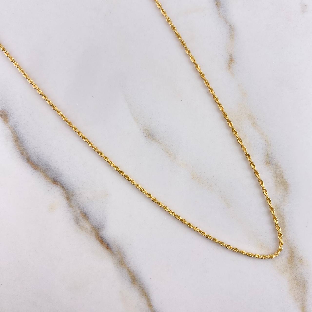 Cadena Lazo 1.10gr / 60cm + Dije Divino Niño 0.25gr / 1.2cm Oro Amarillo (Oferta) $