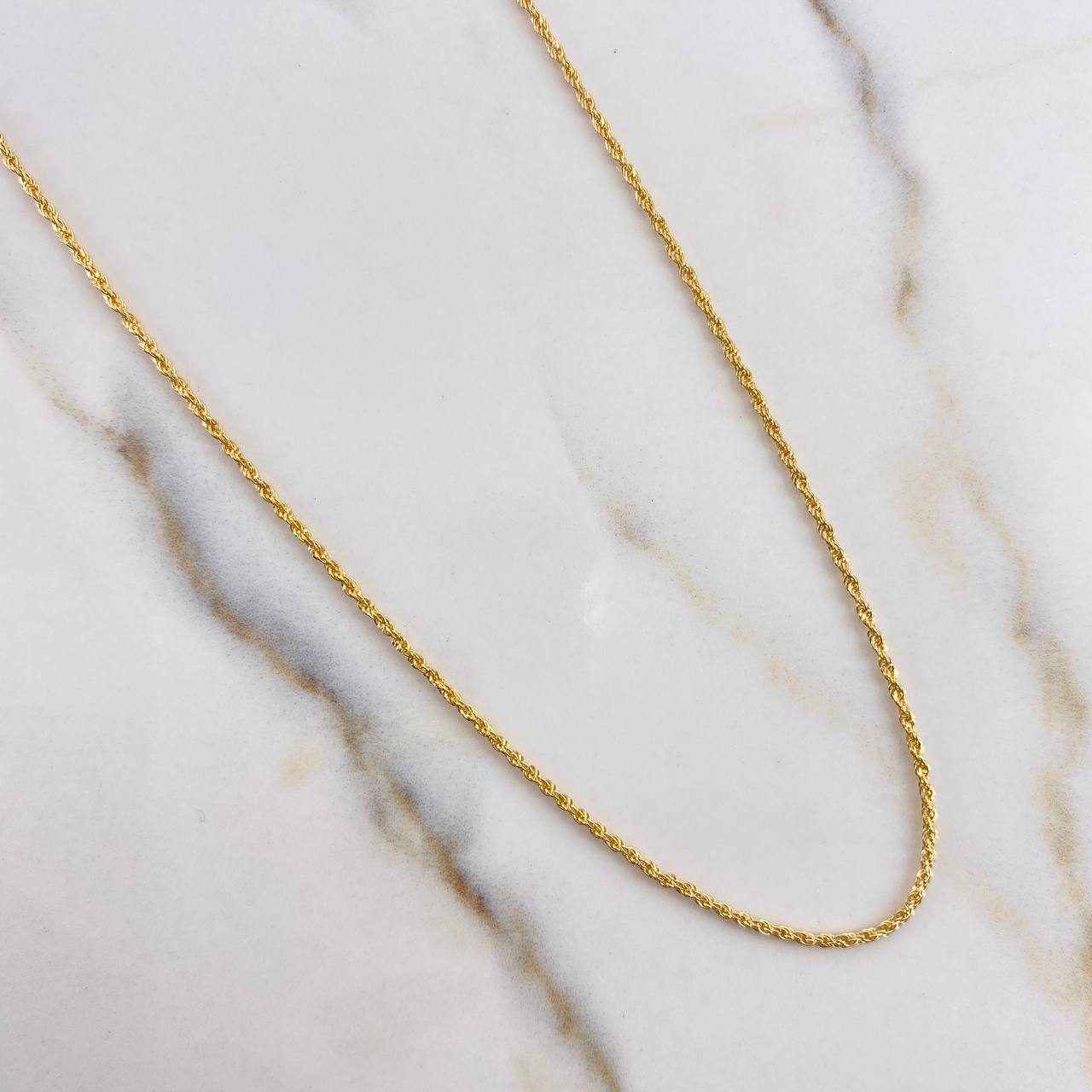 Cadena Lazo 1.05gr / 60cm + Dije Corona 0.40gr / 1.5cm Oro Amarillo (Oferta) $