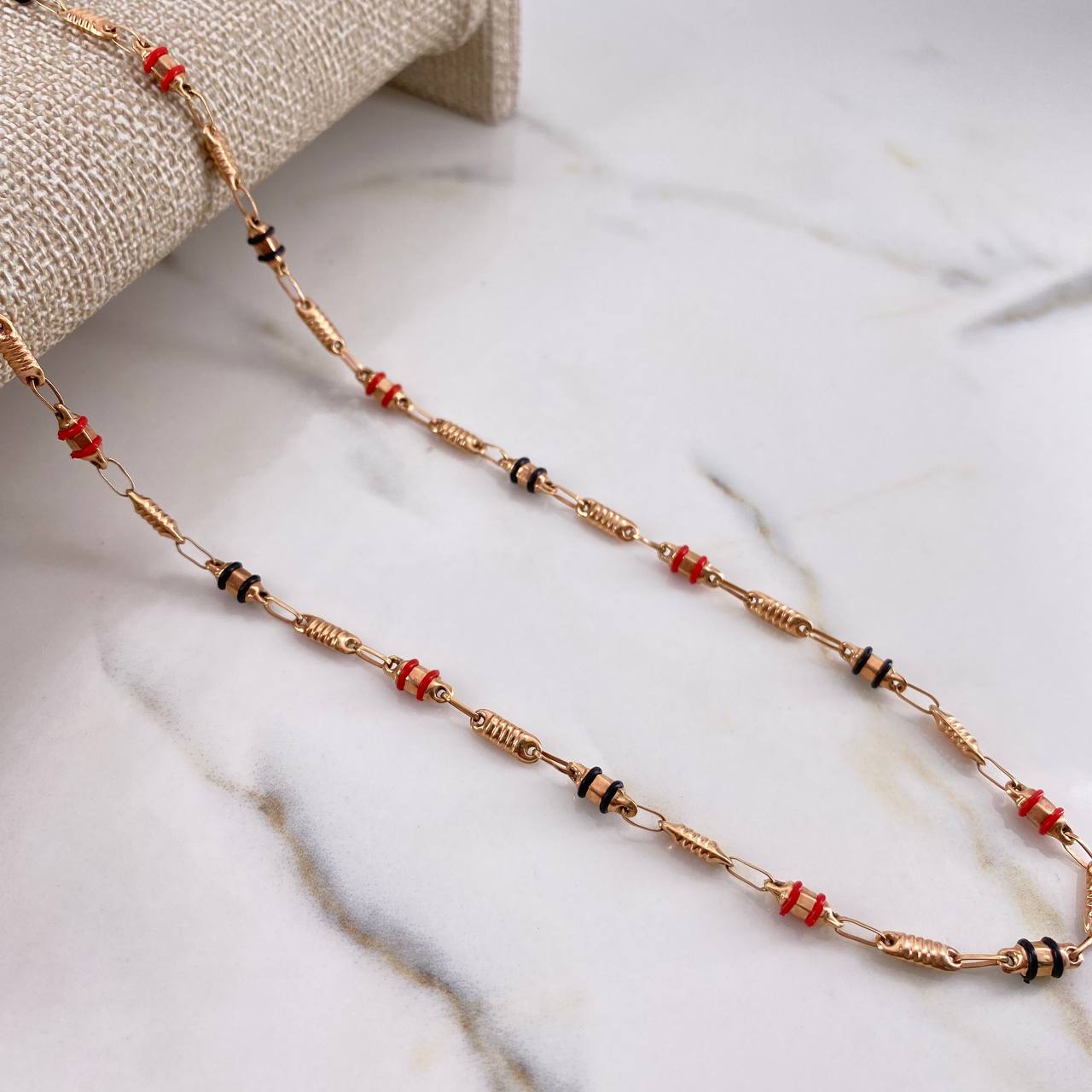 Cadena Rustica 10.3gr / 60cm / 3.5mm Barril Estria Cauchos Oro Rosa $