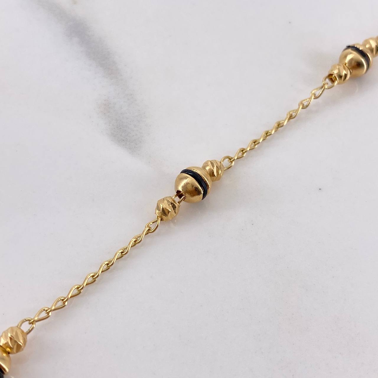 Pulso Rustico Espiga 3.25gr / 17.5cm / 3mm-4mm Cauchos Negros Oro Amarillo $