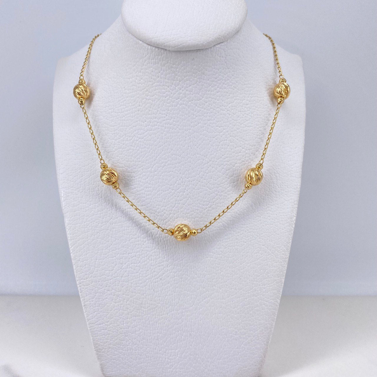 Cadena Espiga 5.8gr / 45cm / 3mm-7mm Bolas Diamantadas Oro Amarillo $