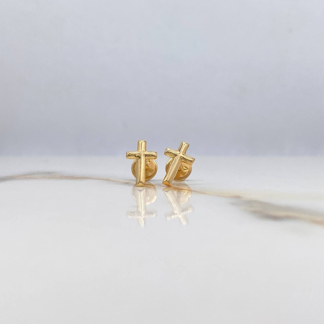 Topos Cruz 0.55gr / Delgada Oro Amarillo $