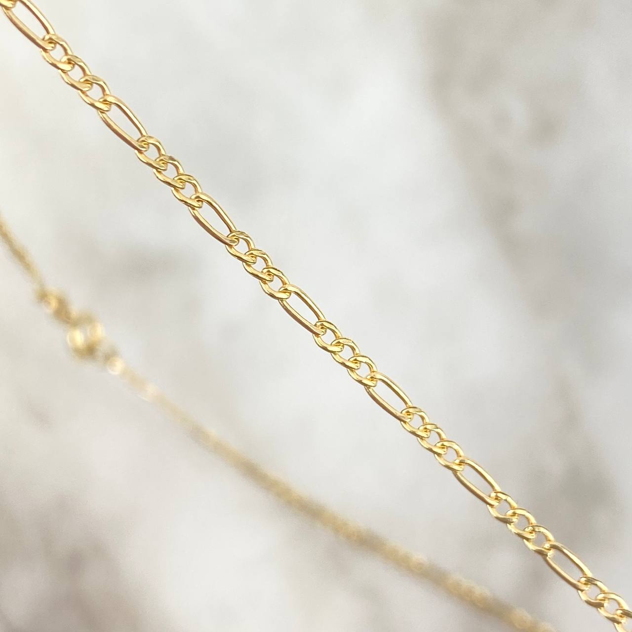 Cadena Figaro 1.25gr / 50cm / 1.5mm Oro Amarillo +1