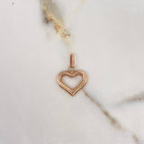 Dije Corazón Silueta 1.15gr / 2.4cm / Troquelado Oro Rosa $