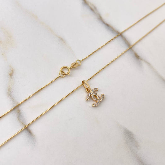 Cadena Veneciana 1.4gr / 50cm + Dije Ola Cruzada Circones Blancos 0.45gr / 1.4cm / Oro Amarillo (Oferta) $