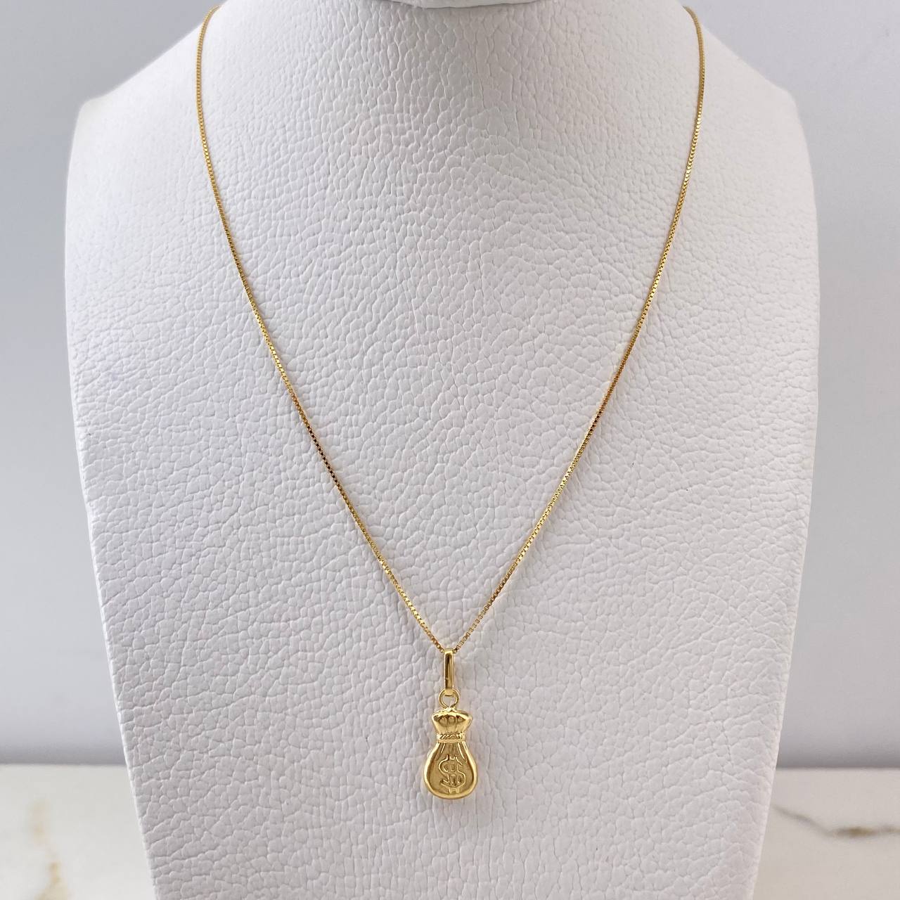 Cadena Veneciana 1.35gr / 50cm + Dije Bolsa De Dinero 0.4gr / 1.9cm / Oro Amarillo (Oferta) $