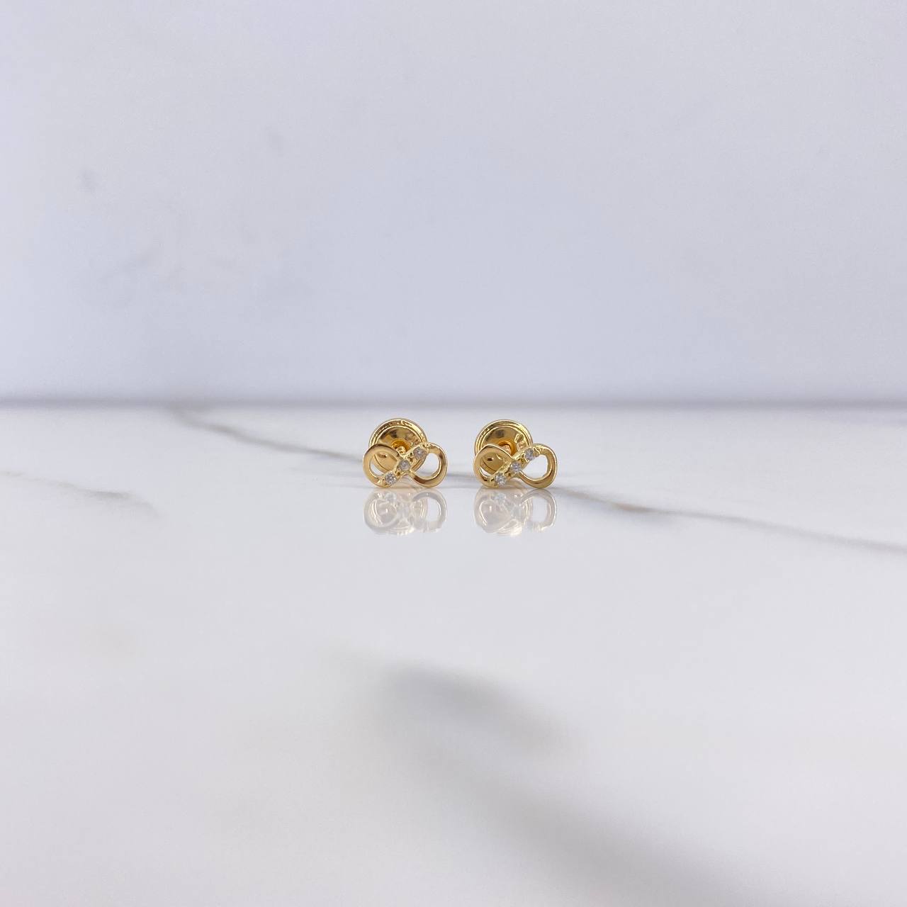 Topos Infinito 0.7gr / Circones Blancos Oro Amarillo $