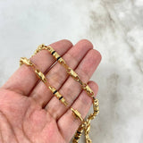 Cadena Rustica Barril Espiral 18.2gr / 60cm / 5mm Cauchos Negros Oro Amarillo ©