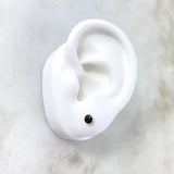 Topos Bisel 0.55gr / 4mm Circon Negro Oro Amarillo 18K ©