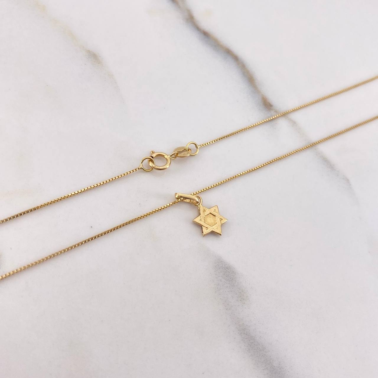 Cadena Veneciana 1.4gr 50cm + Dije Estrella De David 0.2gr 1.2cm / Oro Amarillo (Oferta) $