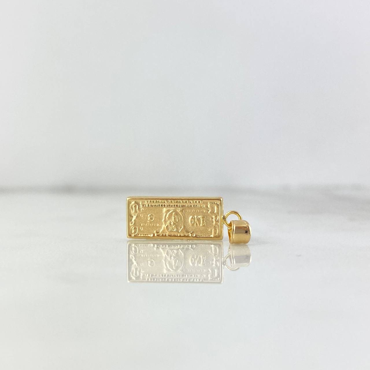 Dije Dólar 0.85gr / 2.3cm / Oro Amarillo ©