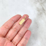 Dije Dólar 0.85gr / 2.3cm / Oro Amarillo ©