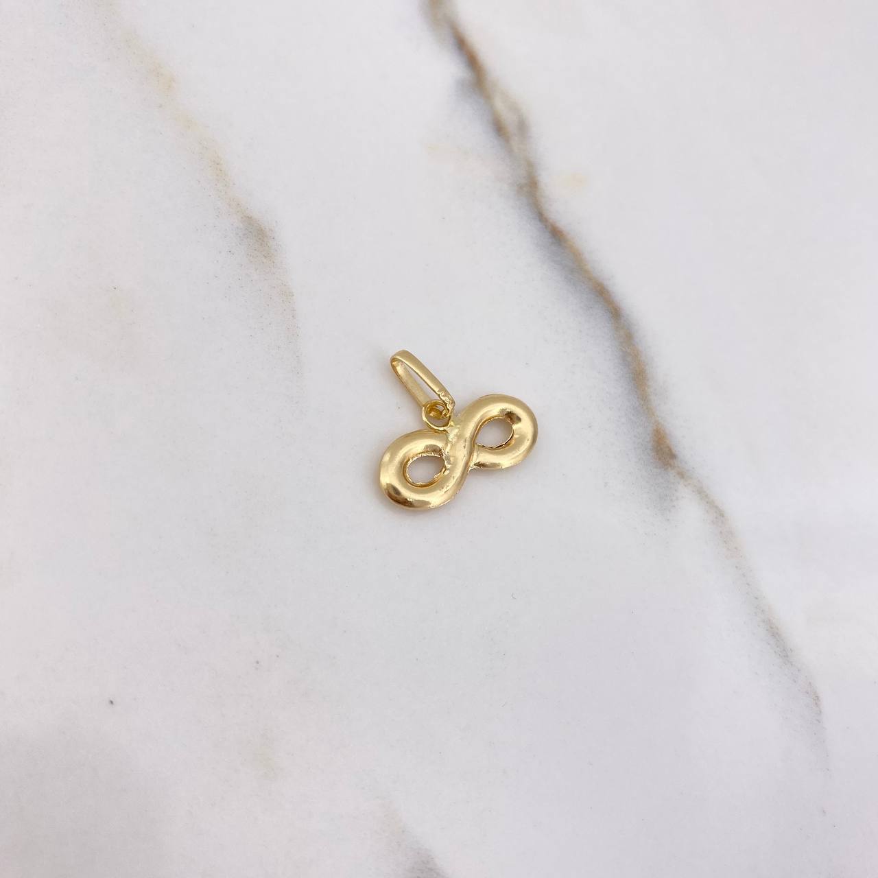 Dije Infinito 0.8gr / 1.3cm / Liso Oro Amarillo &