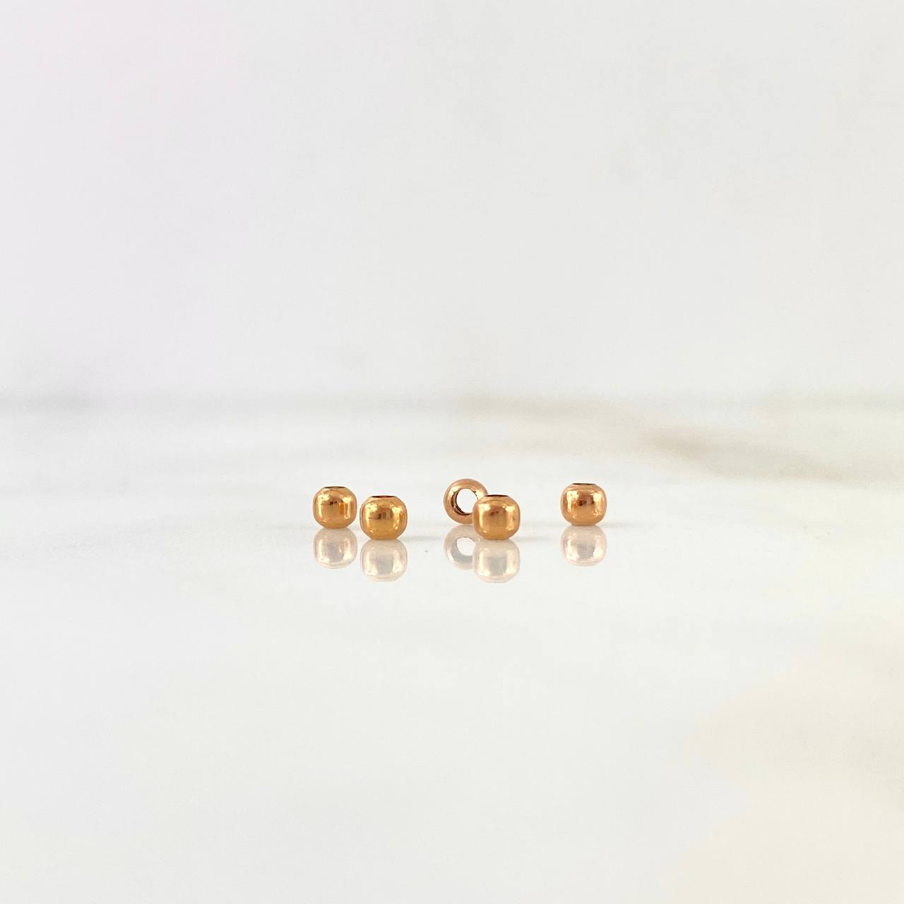 Bola Lisa 0.05gr / 3mm Oro Rosa ©