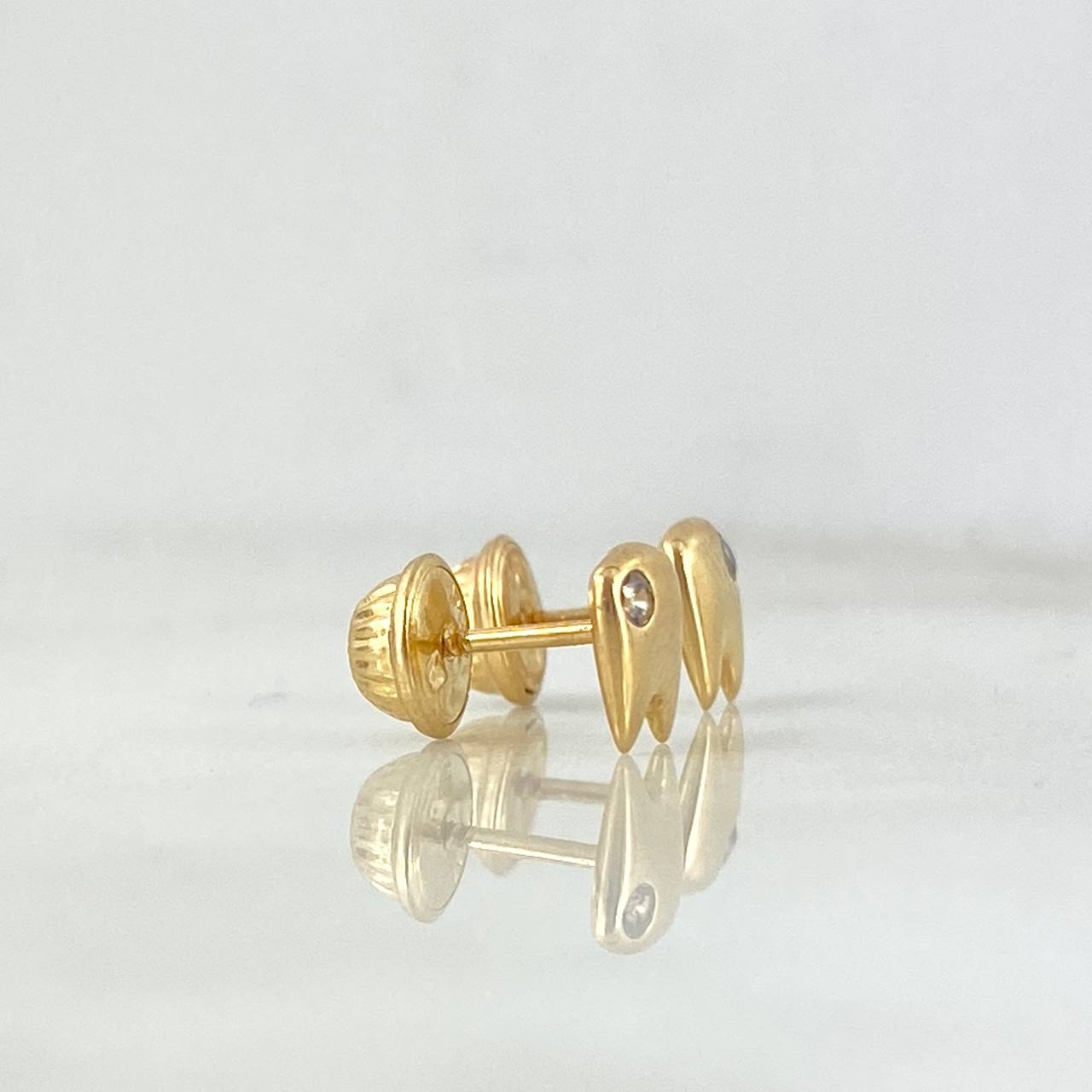 Topos Dientes 0.95gr Circon Blanco Oro Amarillo