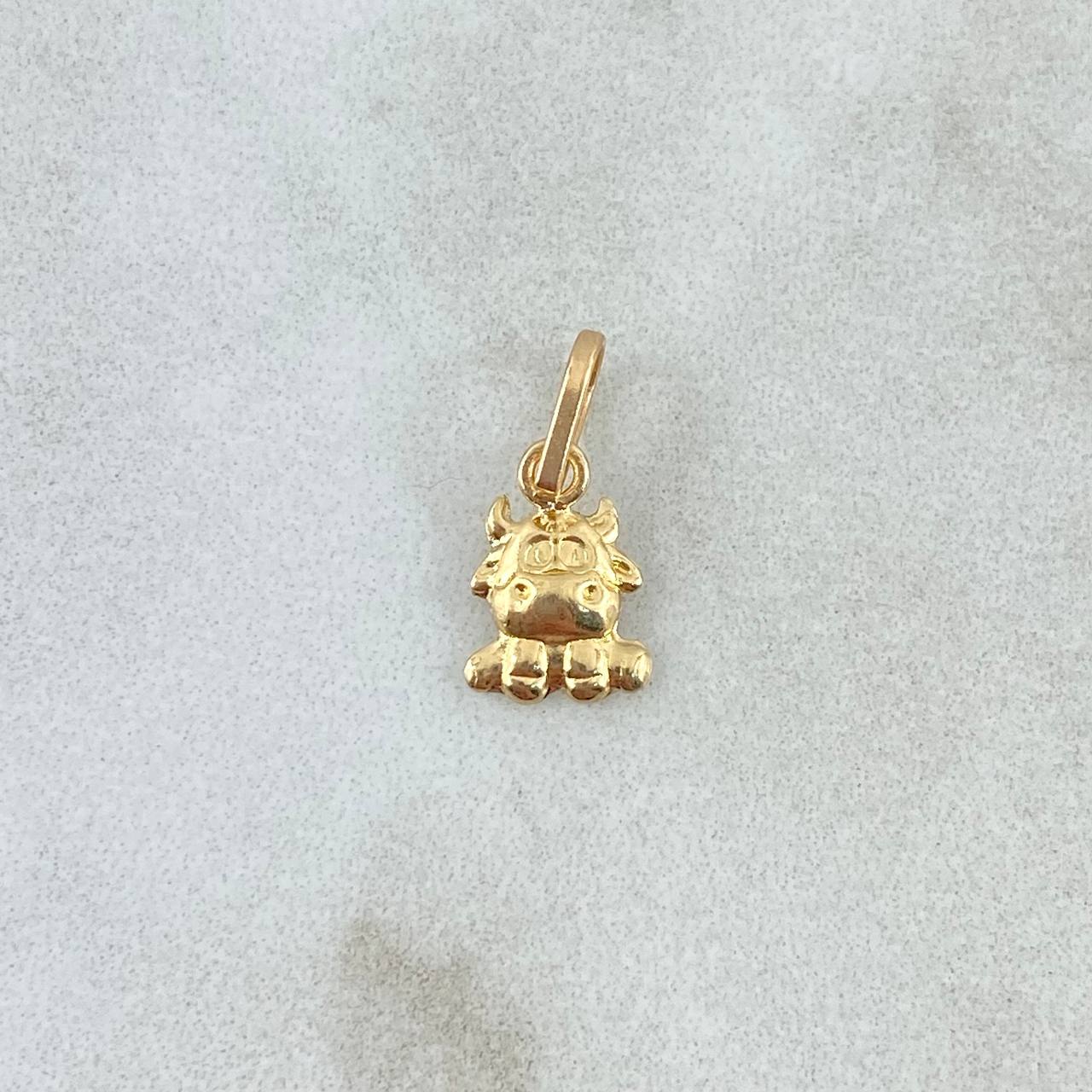 Dije Vaca 0.25gr / 1.3cm / Oro Amarillo ©