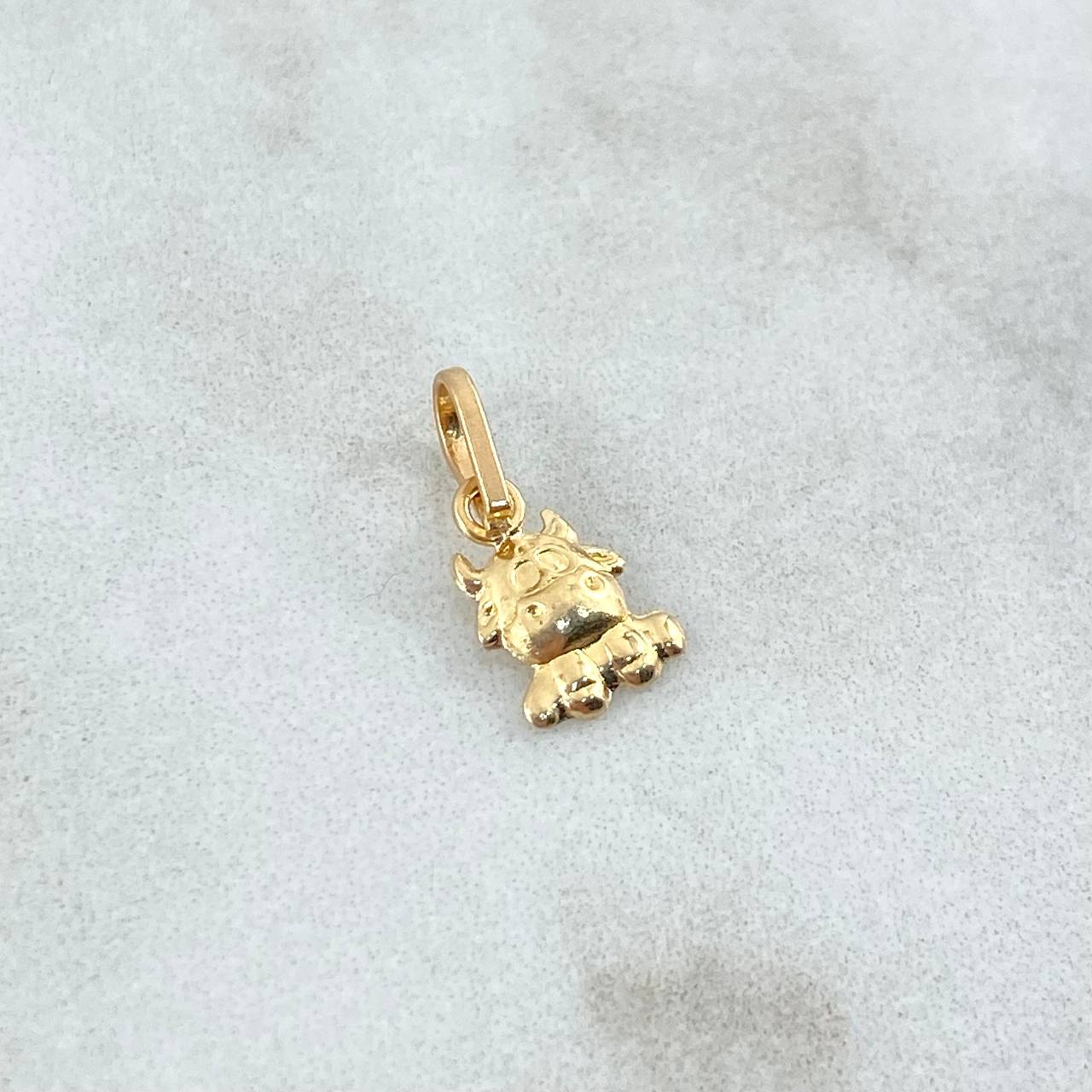 Dije Vaca 0.25gr / 1.3cm / Oro Amarillo ©