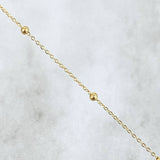 Tobillera Aro Seguido Tipo Militar 0.75gr / 25.5cm / 1mm Bola Lisa Oro Amarillo +3