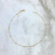 Tobillera Aro Seguido Tipo Militar 0.75gr / 25.5cm / 1mm Bola Lisa Oro Amarillo +3