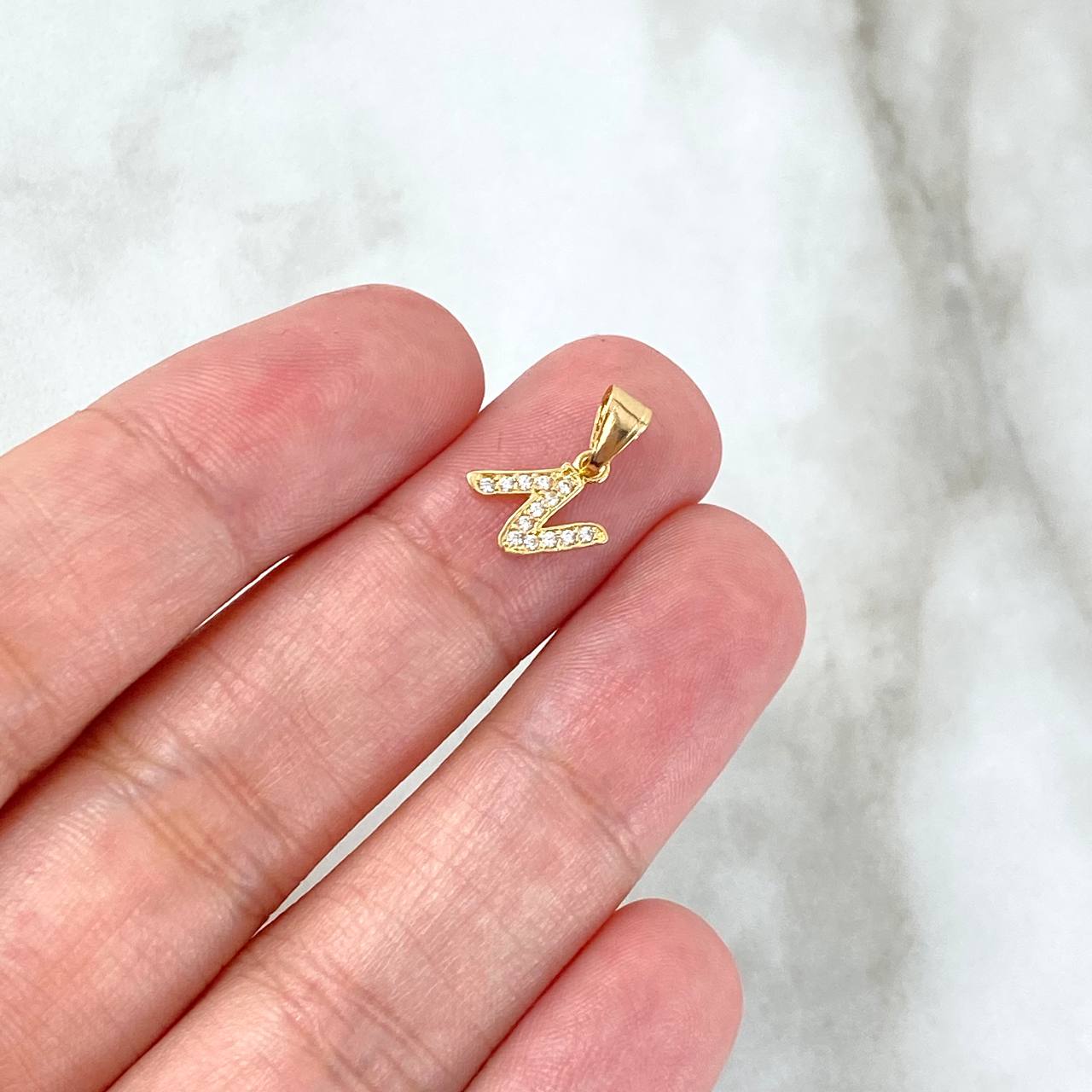Dije Letra N Silueta 0.4gr / 1.3cm / Circones Blancos Oro Amarillo