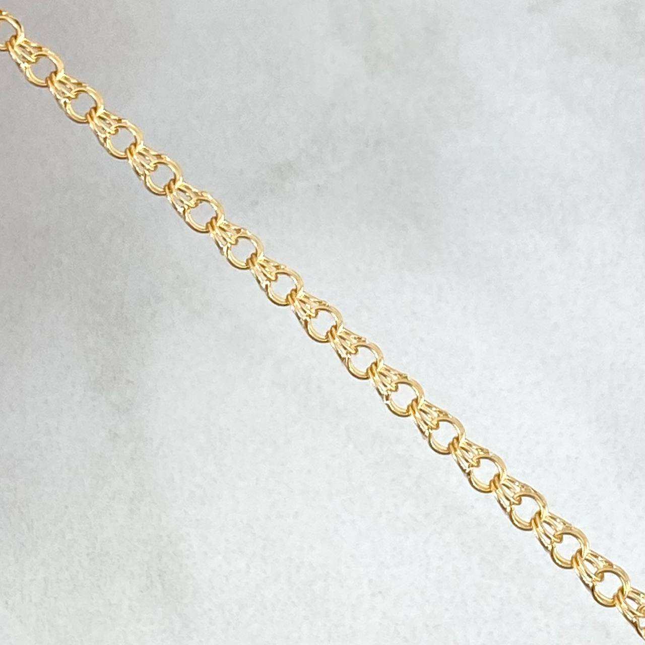 Pulso Aro Seguido 1.25gr / 12.5cm-14cm / 2mm / Placa Rectangular Bordeada Oro Amarillo