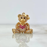 Dije Oso Articulado 4.1gr / 2.5cm / Corbatin Corazón Circones Blancos Fucsias Ojos Negros Oro Amarillo