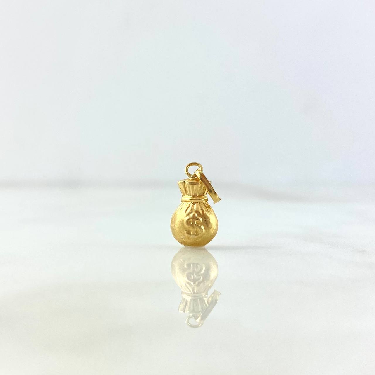 Dije Bolsa de Dinero 0.45gr / 1.8cm / Troquelada Oro Amarillo