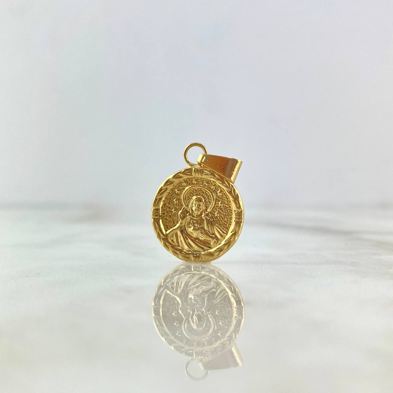 Dije Sagrado Corazón de Jesús 1.55gr / 2.7cm / Marco Trenzado Oro Amarillo