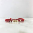 Pulsera Roja Infinito 0.45gr / 3mm Bolas Lisas 2 Und Oro Amarillo ©