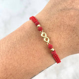 Pulsera Roja Infinito 0.45gr / 3mm Bolas Lisas 2 Und Oro Amarillo ©