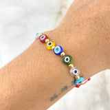 Pulsera Roja Ojos Turcos 0.5gr / 3mm Bolas Lisas 10 Und Oro Amarillo ©