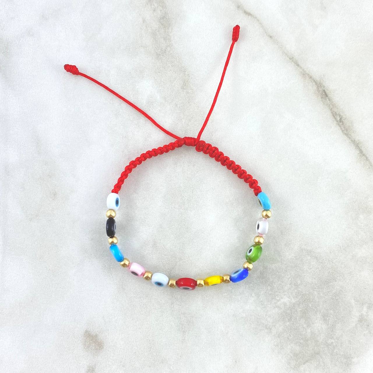 Pulsera Roja Ojos Turcos 0.5gr / 3mm Bolas Lisas 10 Und Oro Amarillo ©