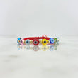 Pulsera Roja Ojos Turcos 0.5gr / 3mm Bolas Lisas 10 Und Oro Amarillo ©