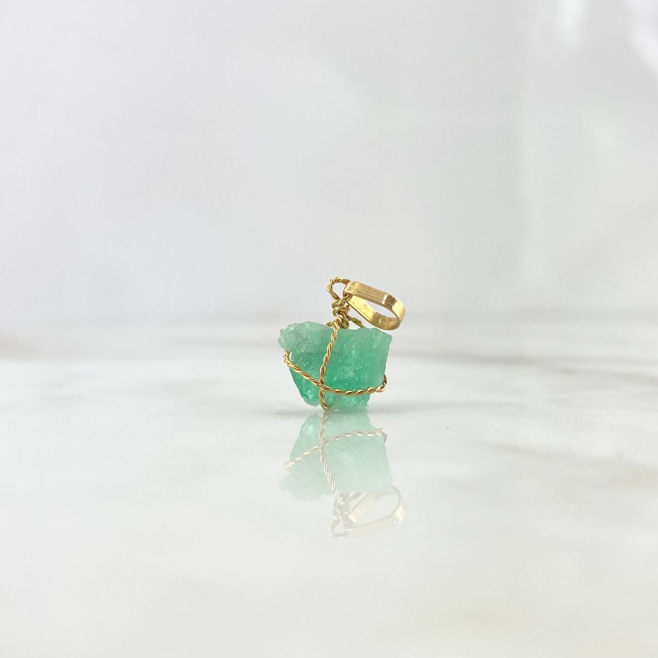 Dije Morralla Esmeralda Mediana Oro Amarillo 18K (Joya) ©
