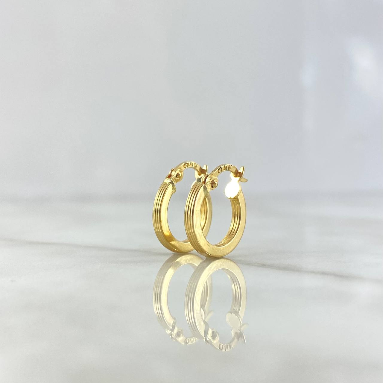 Candongas Andy 1.2gr / 1.7cm / Oro Amarillo 18K ©