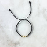 Pulsera Negra Herraje Letra L 0.7gr / 4mm Bolas Discoteca 2 Und Oro Amarillo