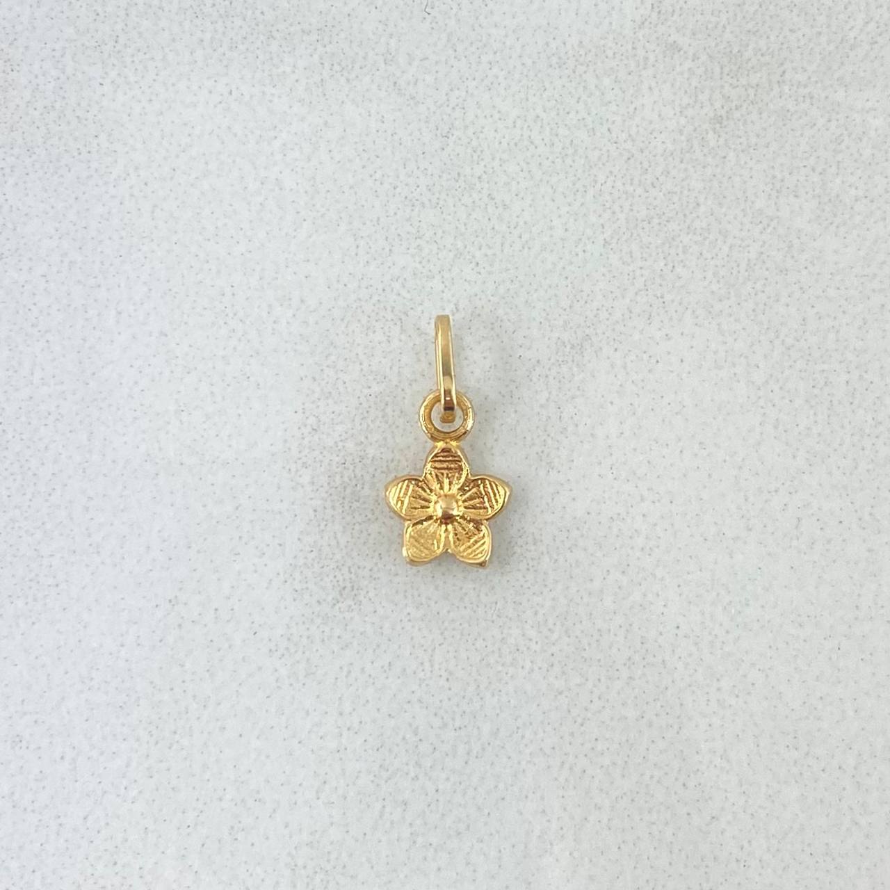 Dije Flor de Sakura 0.3gr / 1.1cm / Oro Amarillo ©