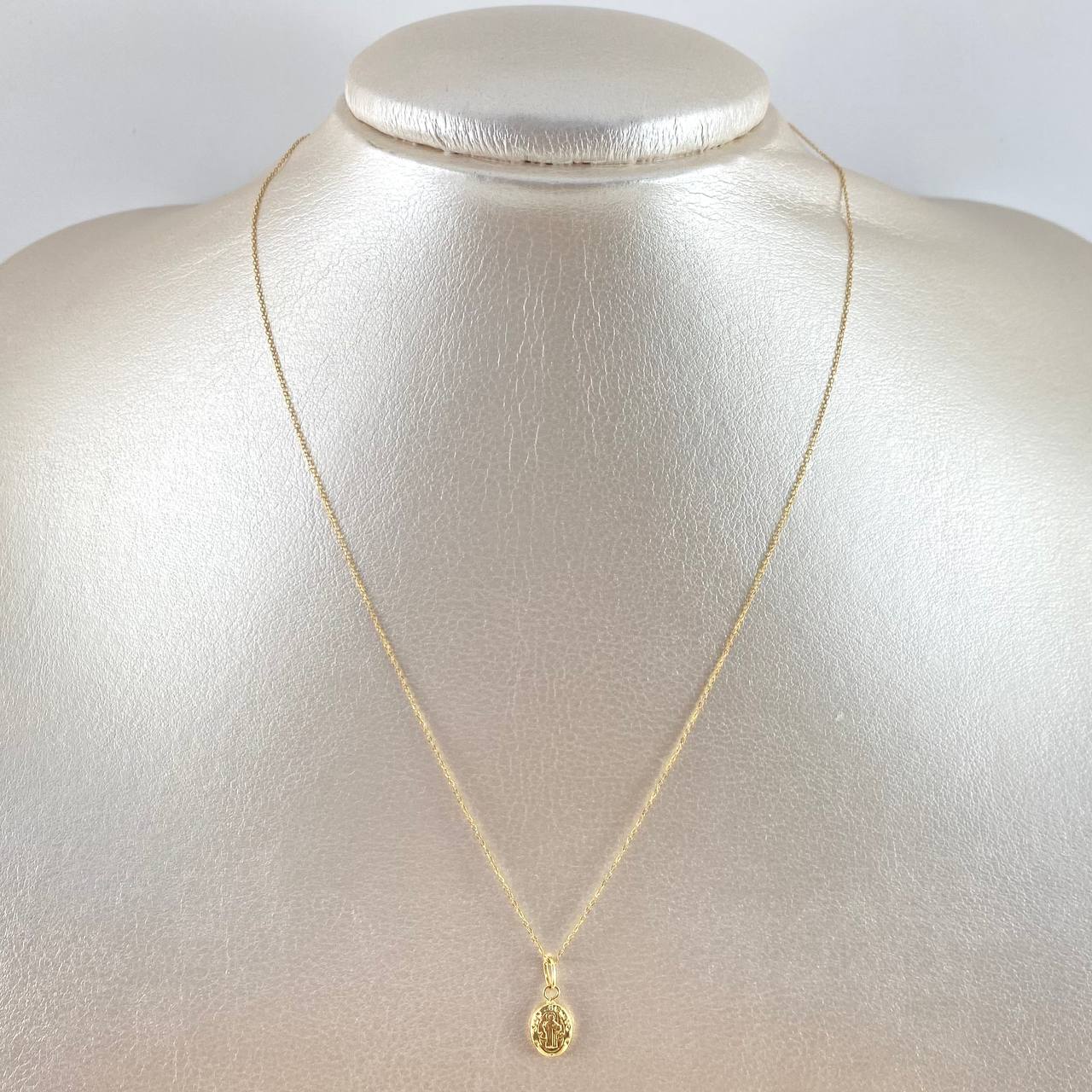 Cadena Aro Seguido 0.5gr / 40cm / 0.5mm + Dije San Benito - Ovalado 0.3gr / 1.4cm Oro Amarillo (Oferta)