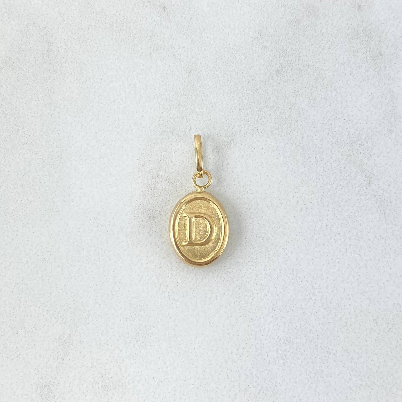 Dije Letra D Ovalada 0.6gr / 1.8cm / Troquelada Oro Amarillo ©