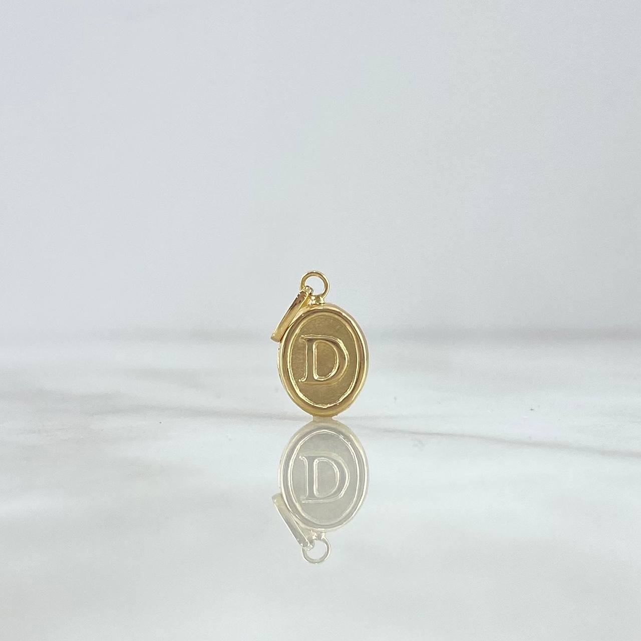 Dije Letra D Ovalada 0.6gr / 1.8cm / Troquelada Oro Amarillo ©