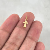 Dije Cruz Abultada 0.2 g / 1.4 cm Oro Amarillo 18K