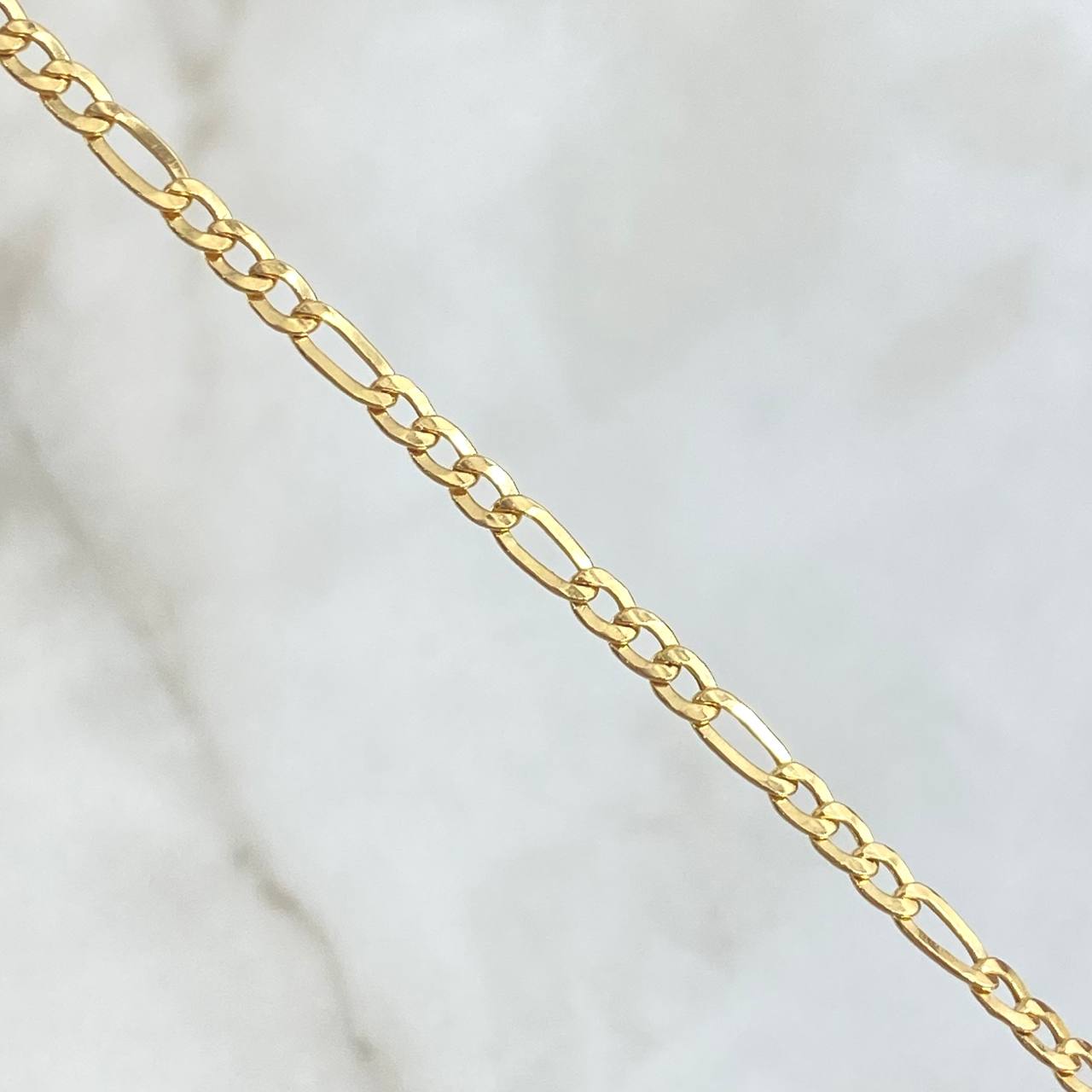 Pulso Figaro 1.4gr / 19cm / 2.5mm Oro Amarillo +1