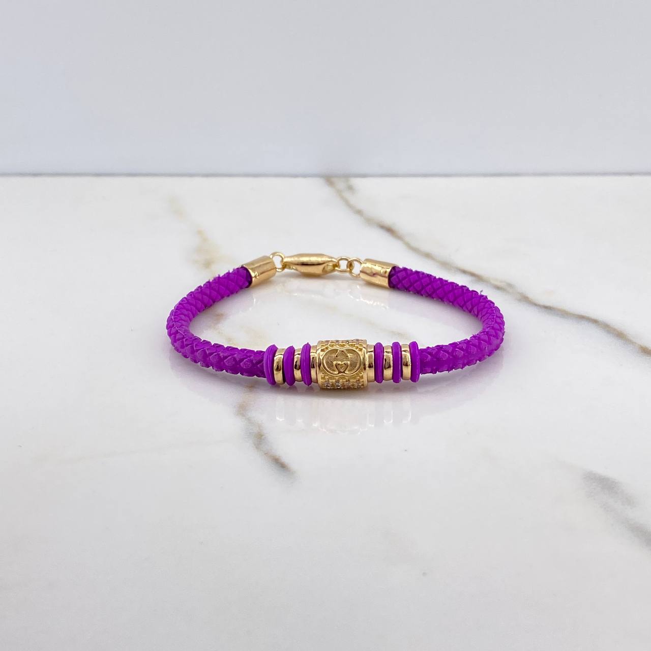 Pulso GG 6.4gr / 17cm / Caucho Morado Circones Blancos Oro Amarillo &