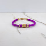 Pulso GG 6.4gr / 17cm / Caucho Morado Circones Blancos Oro Amarillo &