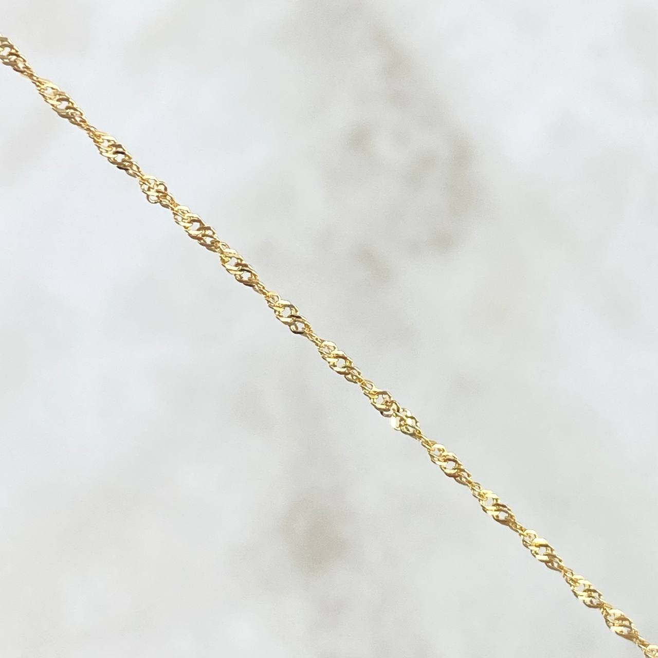 Cadena Singapur 0.85gr / 50cm / 0.9mm Oro Amarillo +3 18K