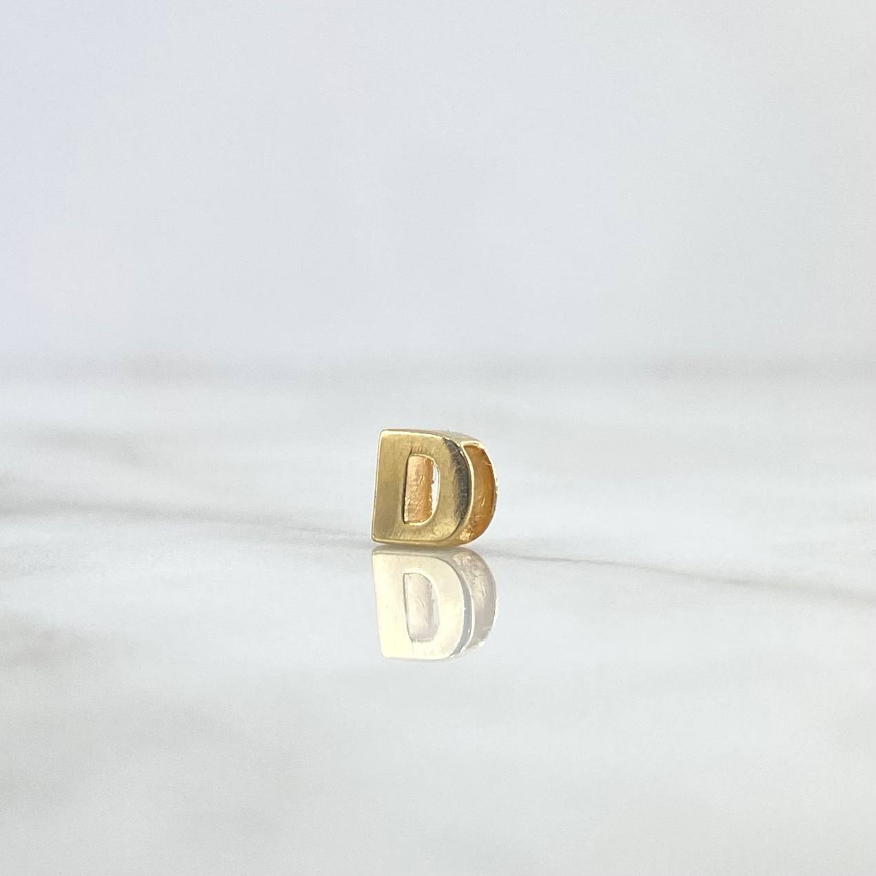 Herraje Letra D 0.35gr / 6mm / Tambor Oro Amarillo 18K ©