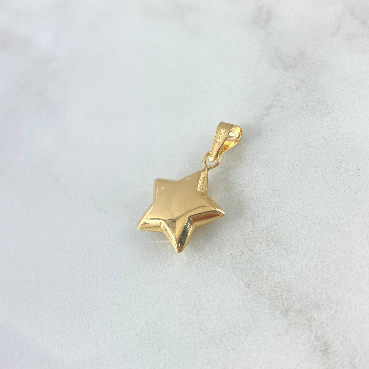 Dije Estrella 0.65gr / 2cm / Troquelada Oro Amarillo ©