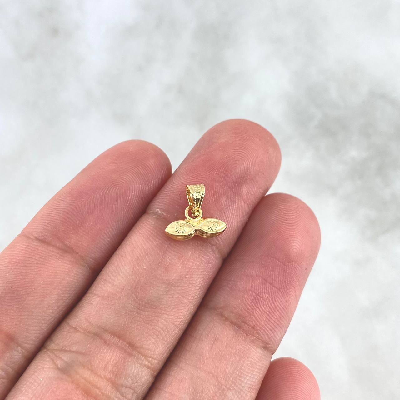 Dije Ojos de Santa Lucía 0.5gr / 1.2cm / Troquelado Oro Amarillo